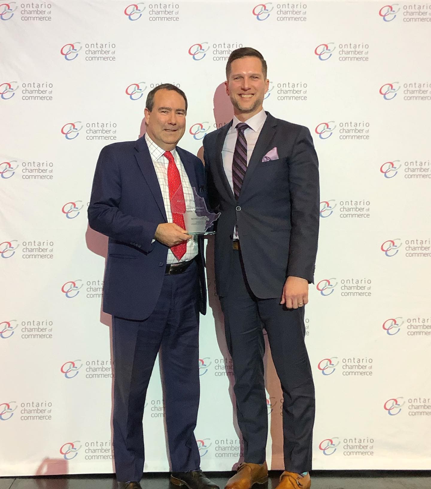 Keanin accepting an award.